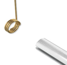 Coiled wire removed from shaft